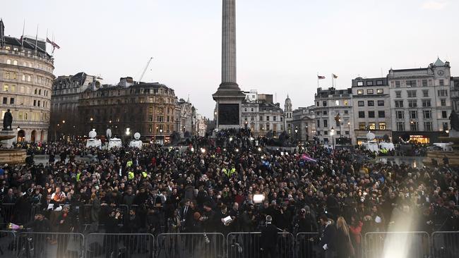 People gather during a candlelit vigil at Trafalgar Square in London to pay their respects to those killed in the terrorist attack. (Pic: Carl Court/Getty Images)