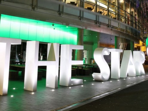 The Star casino, operated by Echo Entertainment Group Ltd., stands illuminated at night in Sydney, Australia, on Monday, Aug. 10, 2015. Echo Entertainment is scheduled to report full-year results on Aug. 12. Photographer: Brendon Thorne/Bloomberg