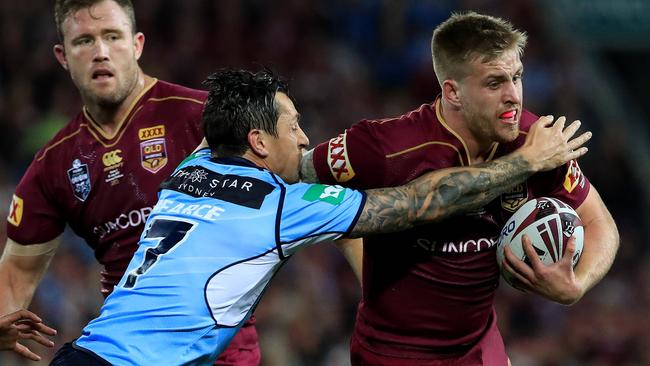 Cameron Munster takes on the Blues defence at Suncorp Stadium. Picture: Adam Head