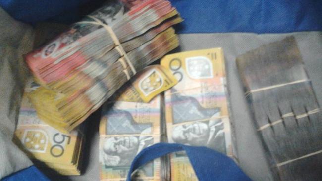 Some of the cash seized after a raid on Mr Battah’s St Clair home. Photo courtesy of NSW Police.