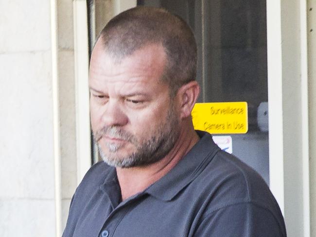 Simpson Sports owner Shane James Simpson being arrested by police. New South Wales State and Local Police raided Simpson Sports firearms shop in Port Kembla just after 9am this morning. The male owner was opened the store for police and was then arrested and taken to Lake Illawarra Police Station for alleged illegal supply of firearms. Picture: Dylan Robinson