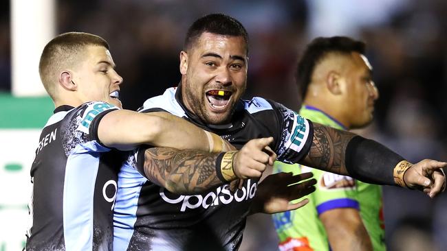 SYDNEY, AUSTRALIA — JULY 20: Andrew Fifita (R) of the Sharks celebrates with his teammate Jayden Brailey (L) of the Sharks after scoring a try Andrew Fifita during the round 19 NRL match between the Cronulla Sharks and the Canberra Raiders at Southern Cross Group Stadium on July 20, 2018 in Sydney, Australia. (Photo by Mark Kolbe/Getty Images)