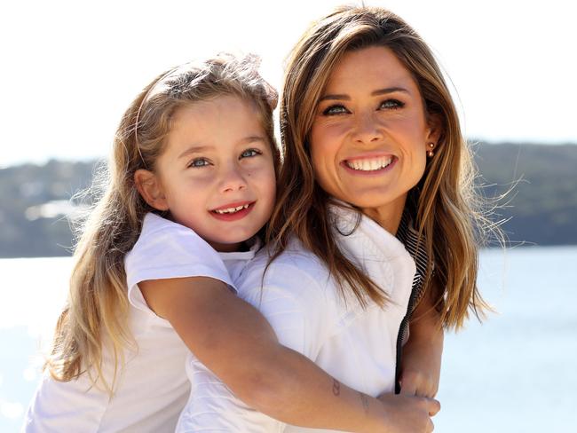 Amber Sherlock with daughter Piper at Balmoral beach. Picture: Brianne Makin