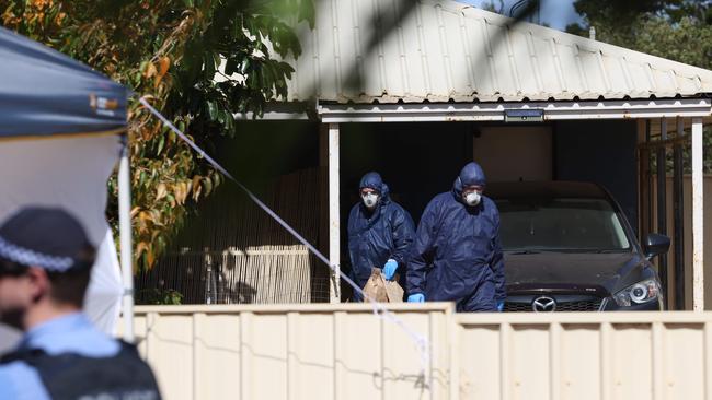 Police forensics at the house where Cleo was found. Picture: Colin Murty