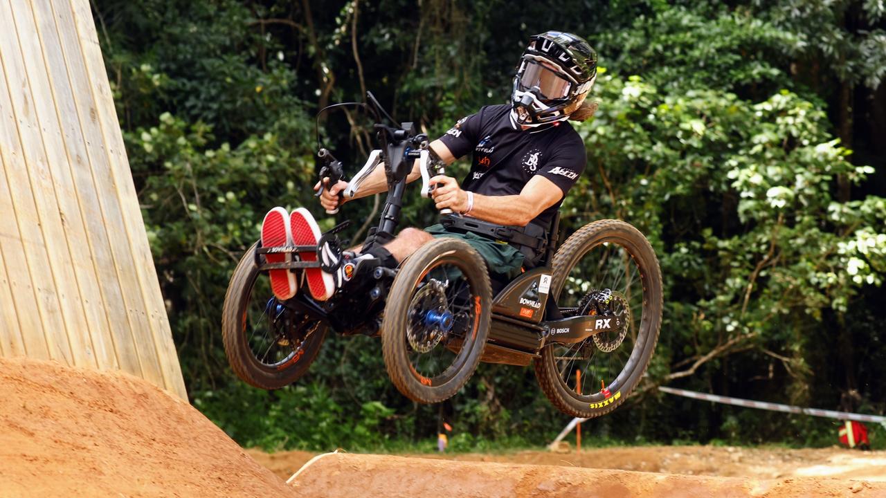 Grant Allen test rides an adaptive mountain bike for all abilities on the slalom track on Day Two of the Crankworx Cairns mountain bike festival, held at the Smithfield Mountain Bike Park. Picture: Brendan Radke