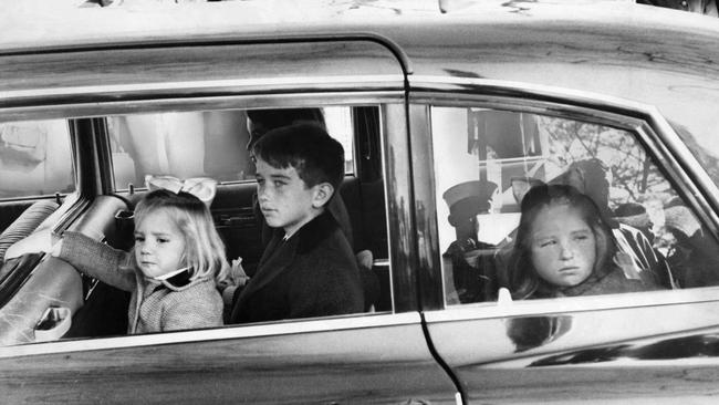 From left, Kara Kennedy, daughter of Ted Kennedy, Robert F. Kennedy Jr, and Courtney Kennedy, daughter of Robert F. Kennedy, on the day of President John F. Kennedy's burial in 1963. Picture: The Boston Globe via Getty Images