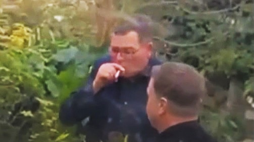 Daniel Andrews caught smoking. Picture: Supplied