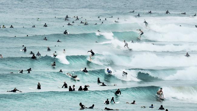 PEAK HOUR: Surfers fill the stretch from Snapper Rocks down to Greenmount. Picture: Luke Marsden.