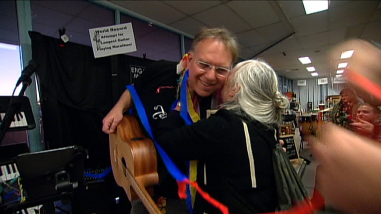 Sydney musician plays guitar for 125 hours, smashing world record