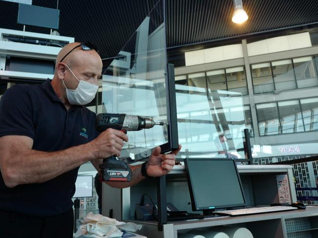 Plastic shields are installed around office desks at Nice International Airport as it prepares for the return of workers. Picture: AFP