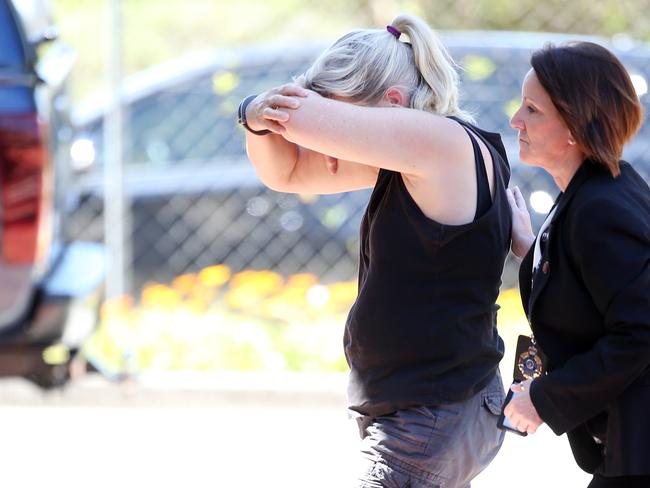 Julene Thorburn led into Logan Police Station for questioning over Tiahleigh’s murder in her home. Picture: Jack Tran