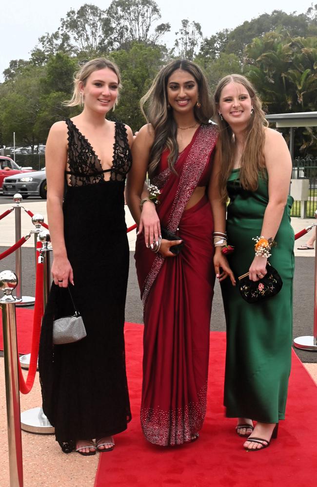 Mona Finney, Davina Sebastian and Jazmyn Bell at Pacific Lutheran College's 2023 formal. Picture: Tegan Annett