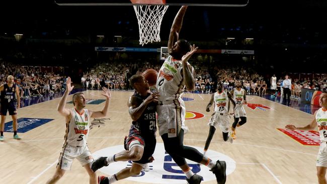 Jerome Randle of the 36ers runs into Cameron Oliver of the Taipans during the Round 19 NBL match between the Adelaide 36ers and the Cairns Taipans at Adelaide Entertainment Centre in Adelaide, Saturday, February 8, 2020. (AAP Image/Kelly Barnes)