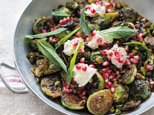 EMBARGO FOR TWAM, 18 JANUARY 2025. FEE MAY APPLY. Brussels sprouts, pomegranate and soft feta salad from Middle Eastern Feasts by Michael Rantissi & Kristy Frawley, photography by Alan Benson. Murdoch Books RRP $39.99.