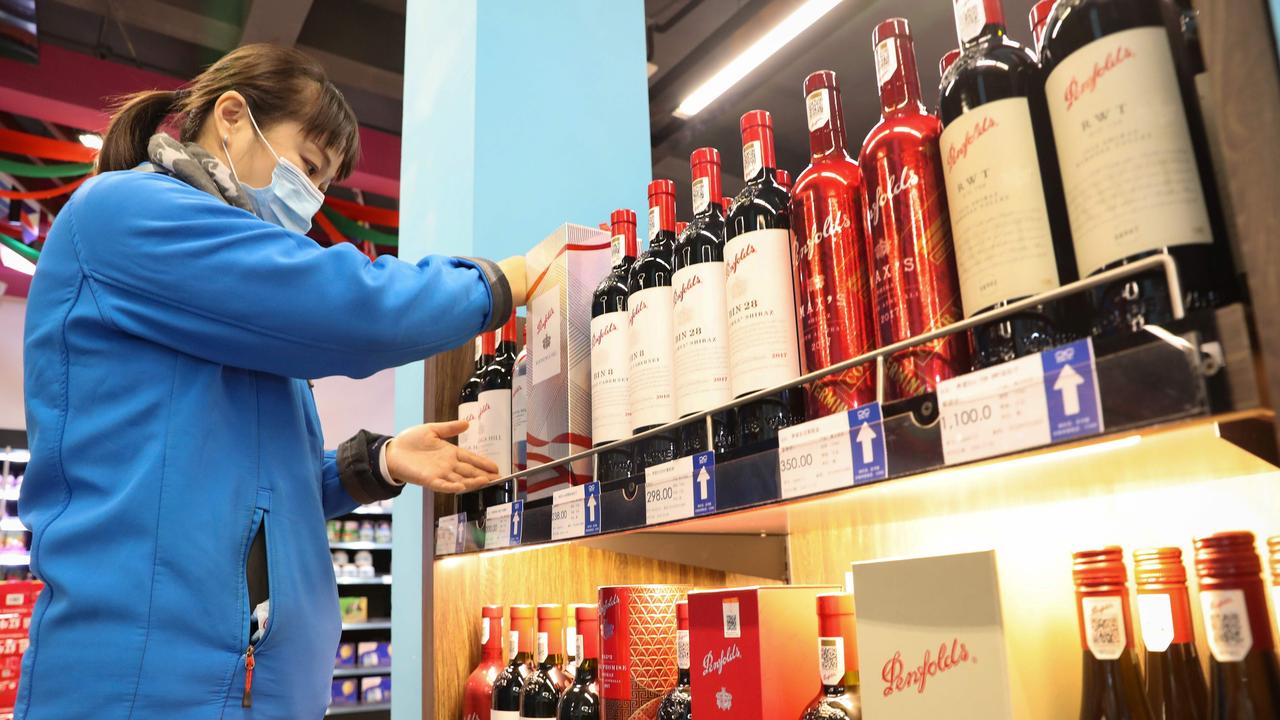 Australian wine is set to be a rare sight on Chinese liquor store shelves soon after Being slapped tariffs of up to 212 per cent on imports. (Photo by STR / AFP) / China OUT