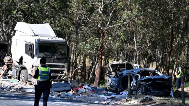 Police and emergency services have rushed to Main South Rd on Wattle Flat, after a crash between multiple cars and a truck. Picture: Naomi Jellicoe