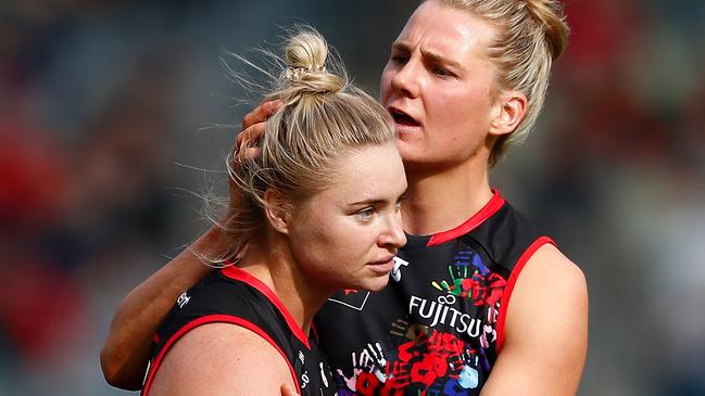 Best afield Daria Bannister and Jacqui Vogt celebrate after beating the Sydney Swans at Ikon Park.