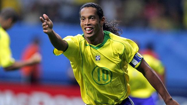Ronaldinho celebrates scoring one of his many goals for Brazil.
