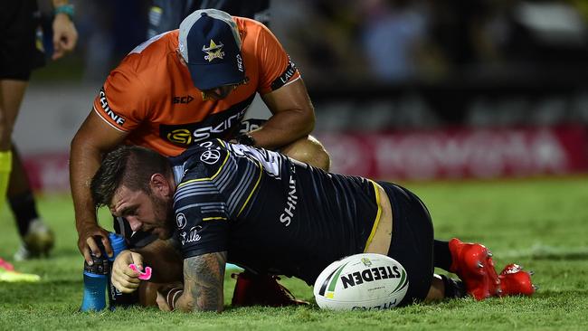 Kyle Feldt down injured for the Cowboys. Picture: Wesley Monts