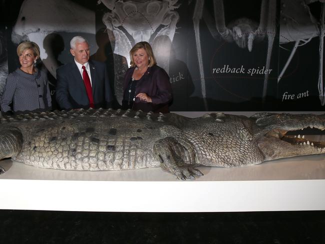 US Vice President Mike Pence (centre) and Australian Foreign Minister Julie Bishop (left) look at an exhibit a cast of an estuarine crocodile at the Australian Museum. Picture: AAP Image/David Moir