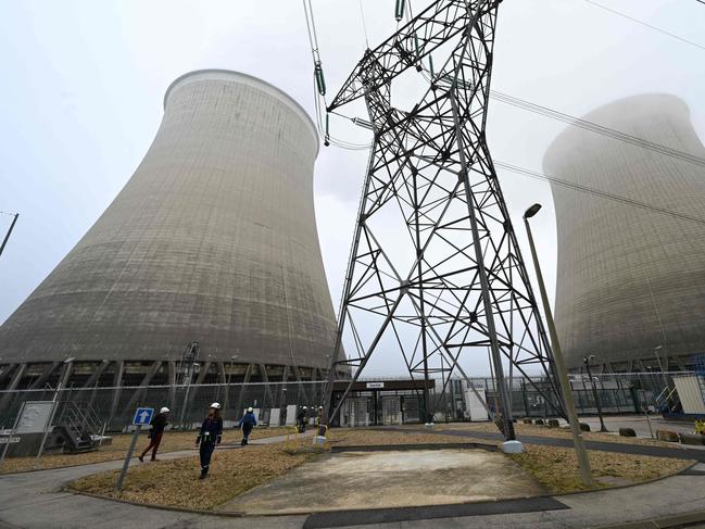 This photograph shows a view taken inside of the nuclear power plant during the visit of French Delegate Minister for Energy, following the launch of the consultation process for the Multi-Year Energy Plan (PPE), in Nogent-sur-Seine on November 8, 2024. The visit provides an opportunity to take stock of EDF's progress in restoring satisfactory availability to the nuclear fleet, particularly in preparation for the winter of 2024-2025, and to discuss work on the major refurbishment program and the increase in nuclear output by 2030. (Photo by Bertrand GUAY / AFP)