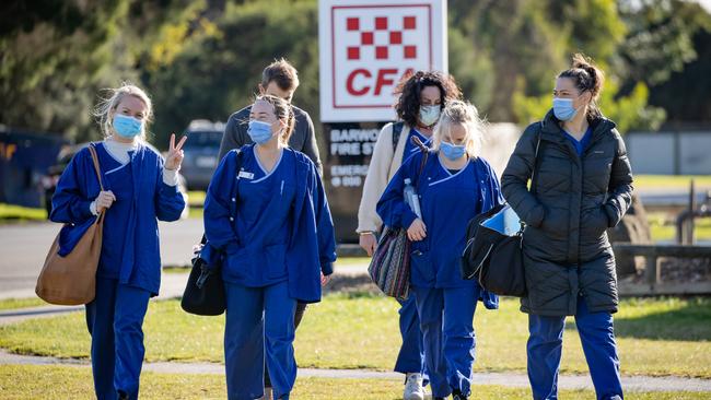 Workers and nurses are racing to set up a testing centre by noon. Picture: Jason Edwards