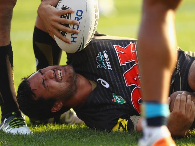 SYDNEY, AUSTRALIA - MAY 22: Peta Hiku of the Panthers grimaces as he lies on the ground with an injury during the round 11 NRL match between the Penrith Panthers and the Gold Coast Titans at Pepper Stadium on May 22, 2016 in Sydney, Australia. (Photo by Mark Kolbe/Getty Images)