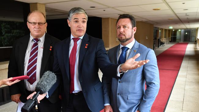 Katter's Australian Party Queensland MP's Shane Knuth (left), Robbie Katter (centre) and Nick Dametto (right) at Queensland Parliament House in Brisbane. (AAP Image/Darren England)