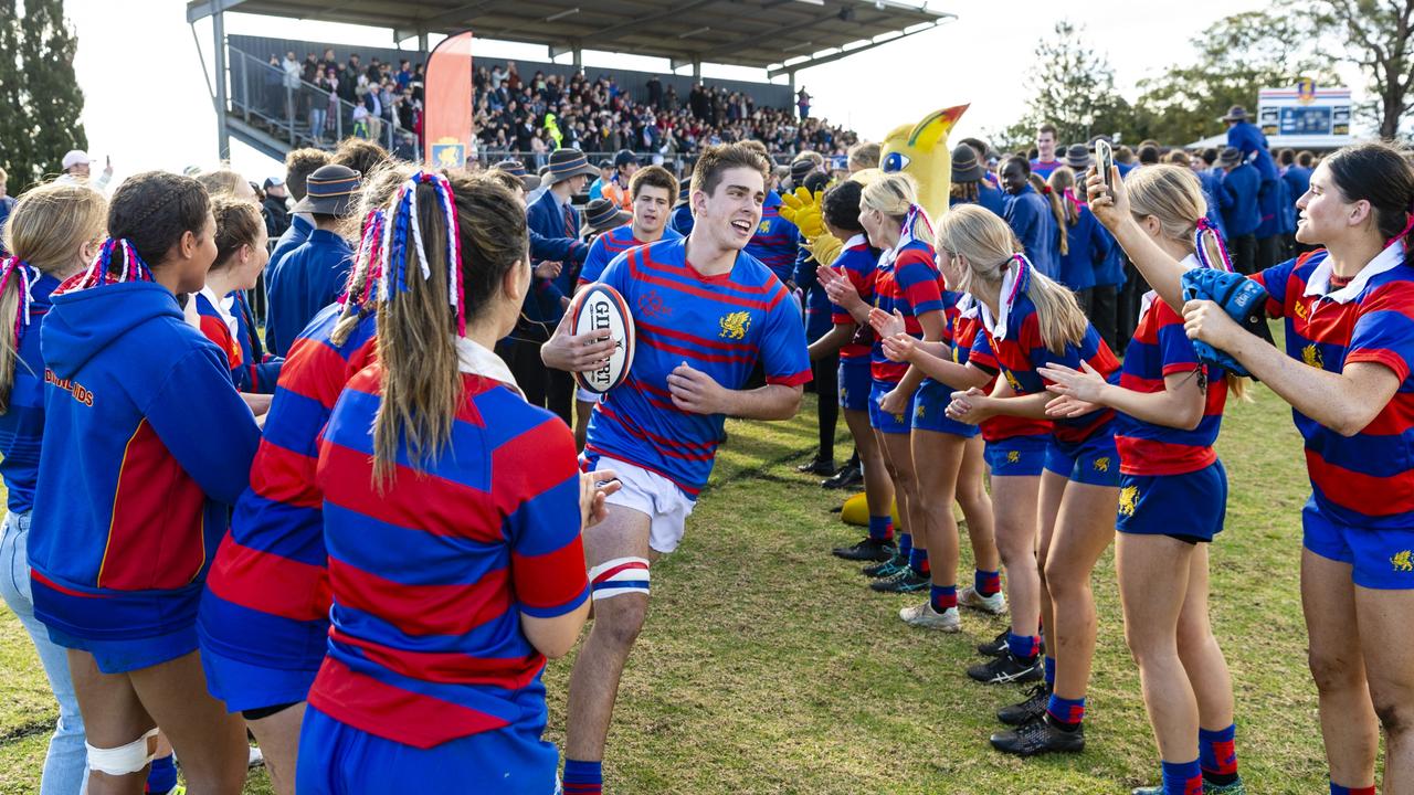 Downlands First XV rugby co-captain Rhys Chadburn runs out with the team to face Grammar in O'Callaghan Cup on Grammar Downlands Day at Downlands College, Saturday, August 6, 2022. Picture: Kevin Farmer