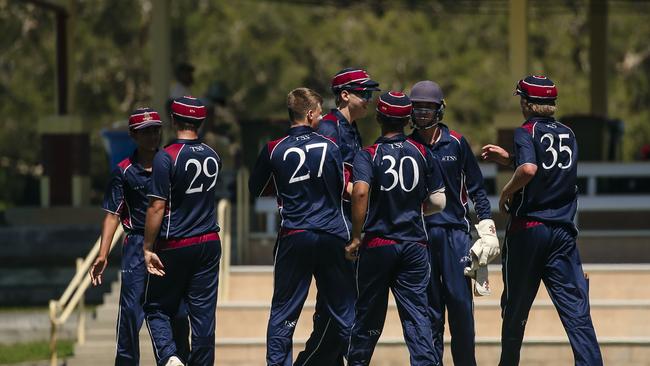 TSS First 11 celebrate the 2nd BHS wicket of Callum McCatthy, caught behind as The Southport School v Brisbane State High School at The Southport School/Village Green. Picture: Glenn Campbell