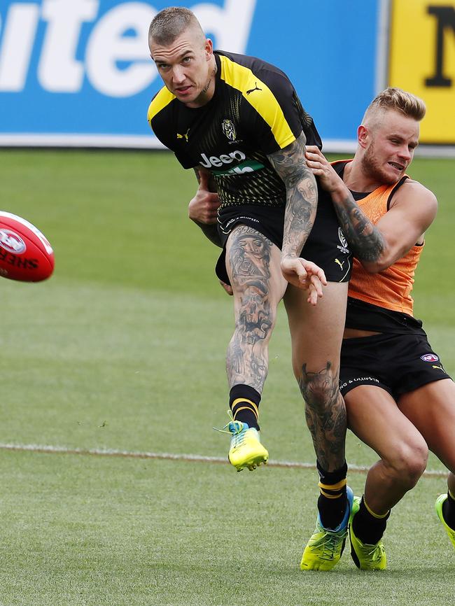 Brandon Ellis tackles Dustin Martin at Richmond training. Picture: Michael Klein