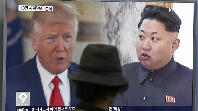 FILE - In this Aug. 10, 2017, file photo, a man watches a television screen showing U.S. President Donald Trump and North Korean leader Kim Jong Un during a news program at the Seoul Train Station in Seoul, South Korea. North Korea said Monday, Sept. 11, 2017 it will make the United States pay a heavy price if a proposal Washington is backing to impose the toughest sanctions ever on Pyongyang is approved by the U.N. Security Council this week. (AP Photo/Ahn Young-joon, File). Picture: Ahn Young-joon