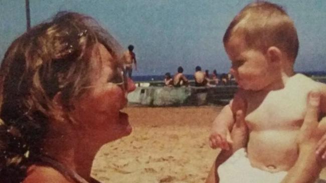 Lynette (Lyn) Dawson with her baby Sherryn at the beach. Source: Facebook.