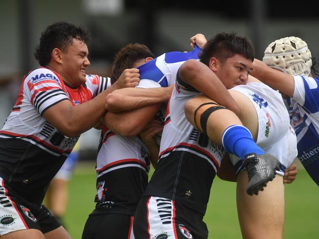 Kirwan High against Ignatius Park College in the Northern Schoolboys Under-18s trials at Brothers Rugby League Club in Townsville. Iggy number 11 Suafai Reupena pushed back. Picture: Evan Morgan