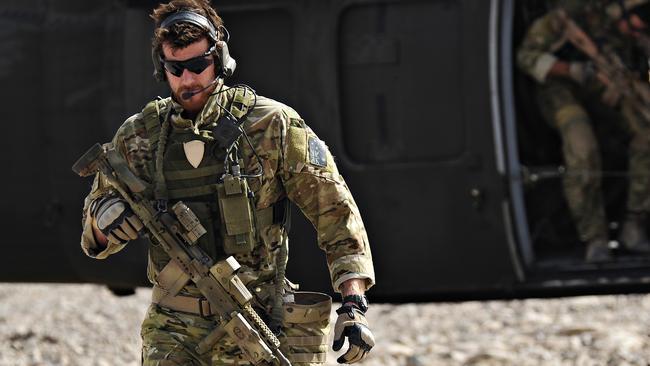Ben Roberts-Smith leaves a helicopter during preparation of the Shah Wali Kot offensive in Afghanistan.