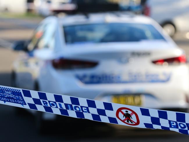 SYDNEY, AUSTRALIA - NEWSWIRE PHOTOS June 14 2022: A general stock image of a Police tape in front of a Police car in Sydney. Picture NCA Newswire/ Gaye Gerard.