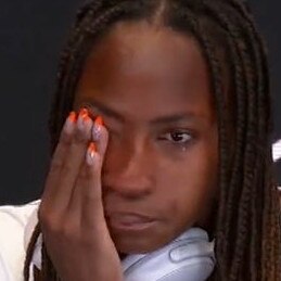 Coco Gauff in tears during her press conference.