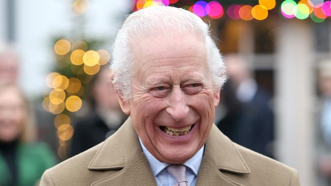 TETBURY, ENGLAND - DECEMBER 13: King Charles III smiles as he arrives for the The King's Foundation's annual 'Crafts at Christmas' at Highgrove Gardens on December 13, 2024 in Tetbury, England. The King's Foundation is a charitable organisation established by His Majesty when he was Prince of Wales, in 1990. Guided by His Majesty's vision and values, the foundation's mission is to foster and strengthen communities where people, places, and the planet can thrive together in harmony. King Charles III continues to serve as the foundation's Royal Founding President. (Photo by Chris Jackson - Pool/Getty Images)