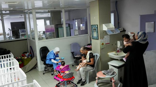 Two girls of Hanan Bayouk triplets are being cared for at Makassed hospital in East Jerusalem. Picture: Reuters