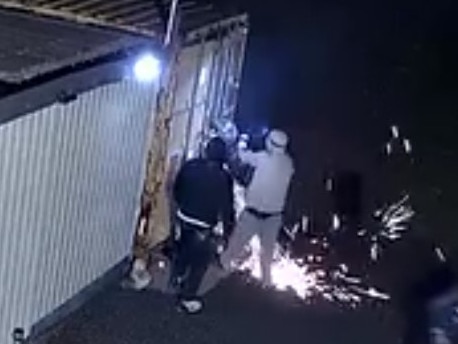 Three masked men were captured on security cameras trying to break into a Dover man's shipping container with an angle grinder. Picture: Supplied.