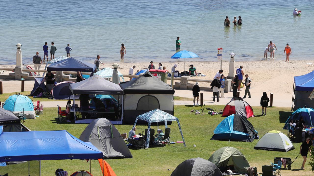 Geelong’s Eastern Beach on January 1, with people and tents across the foreshore. Picture: Mark Wilson