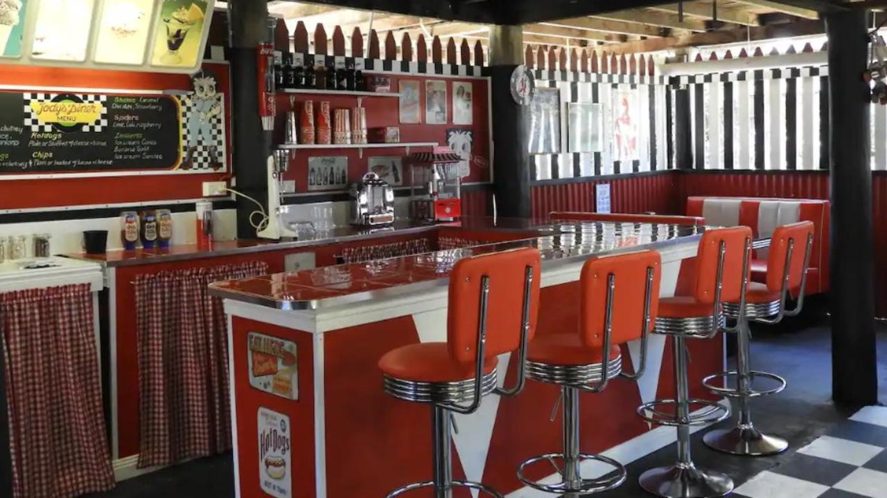 The Chill Grill &amp; Ride Inn features a 1950s diner, pool table and communal BBQ area. Picture: Airbnb