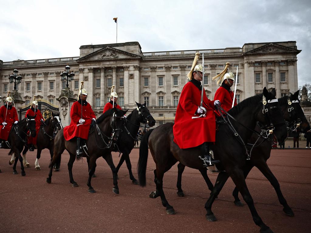 Life Guards, a unit of the Household Cavalry ride their horses past Buckingham Palace. Picture: AFP