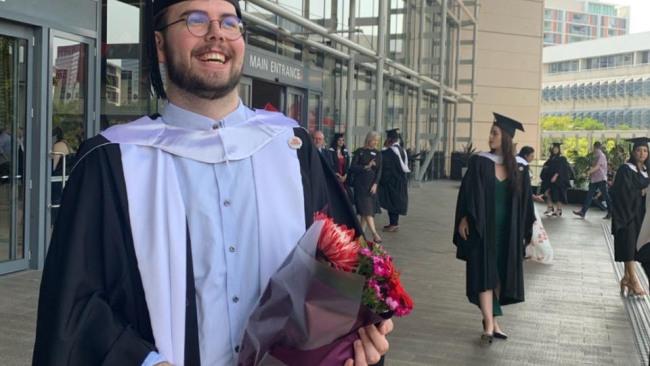 Liam graduating from Griffith University