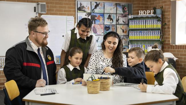 Peter Rose, 29, far left, is in his final year of his teaching degree at St Philip’s Teaching School, along with Bethan Knaus, 31, a course that stresses practical time in classrooms.