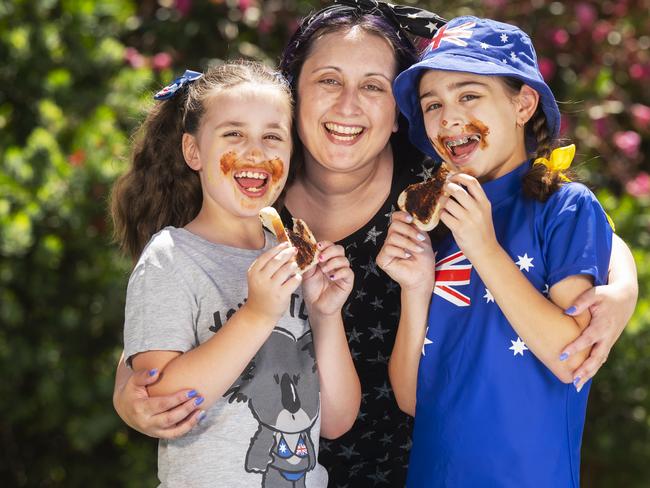 The Saville family love vegemite ,Mum Belinda and Zoe, 8, Isabella, 11, tuck into a Vegemite sandwich. Picture:Rob Leeson.