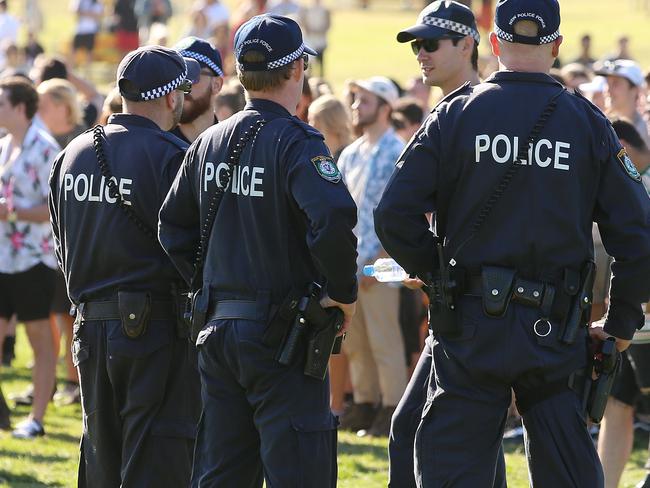 SUNDAY TELEGRAPH - 29/9/18Revelers arrive at the Listen Out Festival in Centennial Park today and meet a heavy police presence. Pic, Sam Ruttyn