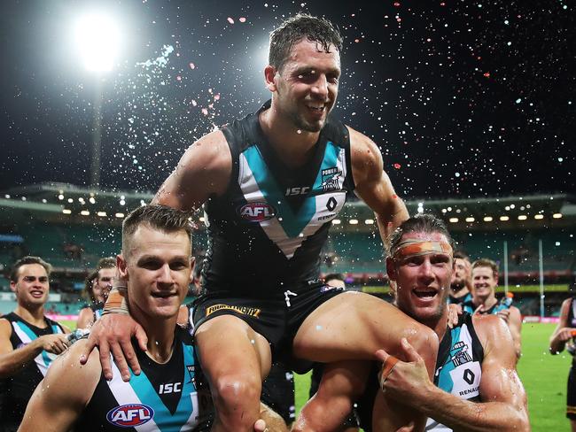 Port Adelaide's Travis Boak is chaired of the ground in his 200th game after the Power defeated the Swans at the SCG. Picture. Phil Hillyard