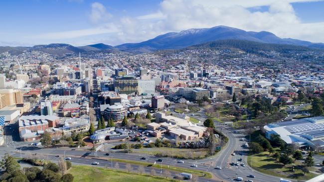 Hobart aerial showing new Remembrance Bridge, ABC ( Railway ) roundabout and the CBD. Mt Wellington with snow. Menzies / Macquarie Street / File / Generic / Drone