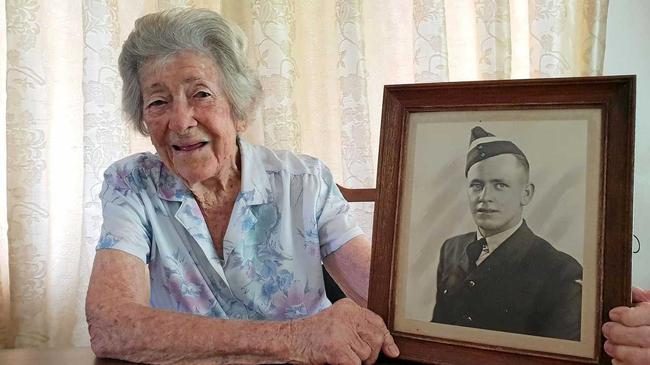 Phyllis Adair holds a picture of her late-brother Sergeant William Edmonds. Picture: Nick Wright